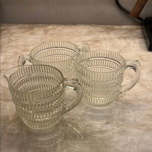 Two creamers and one sugar bowl.  Hazel Atlas 1940’s Beehive ribbed.